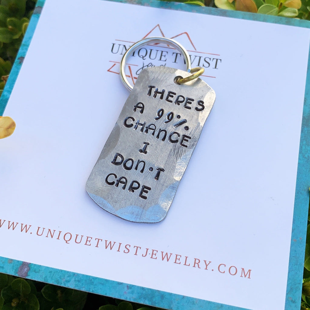 "There's a 99% chance I don't care." Keychain. Hand-stamped aluminum blank on a key ring. Handmade fashion accessories.