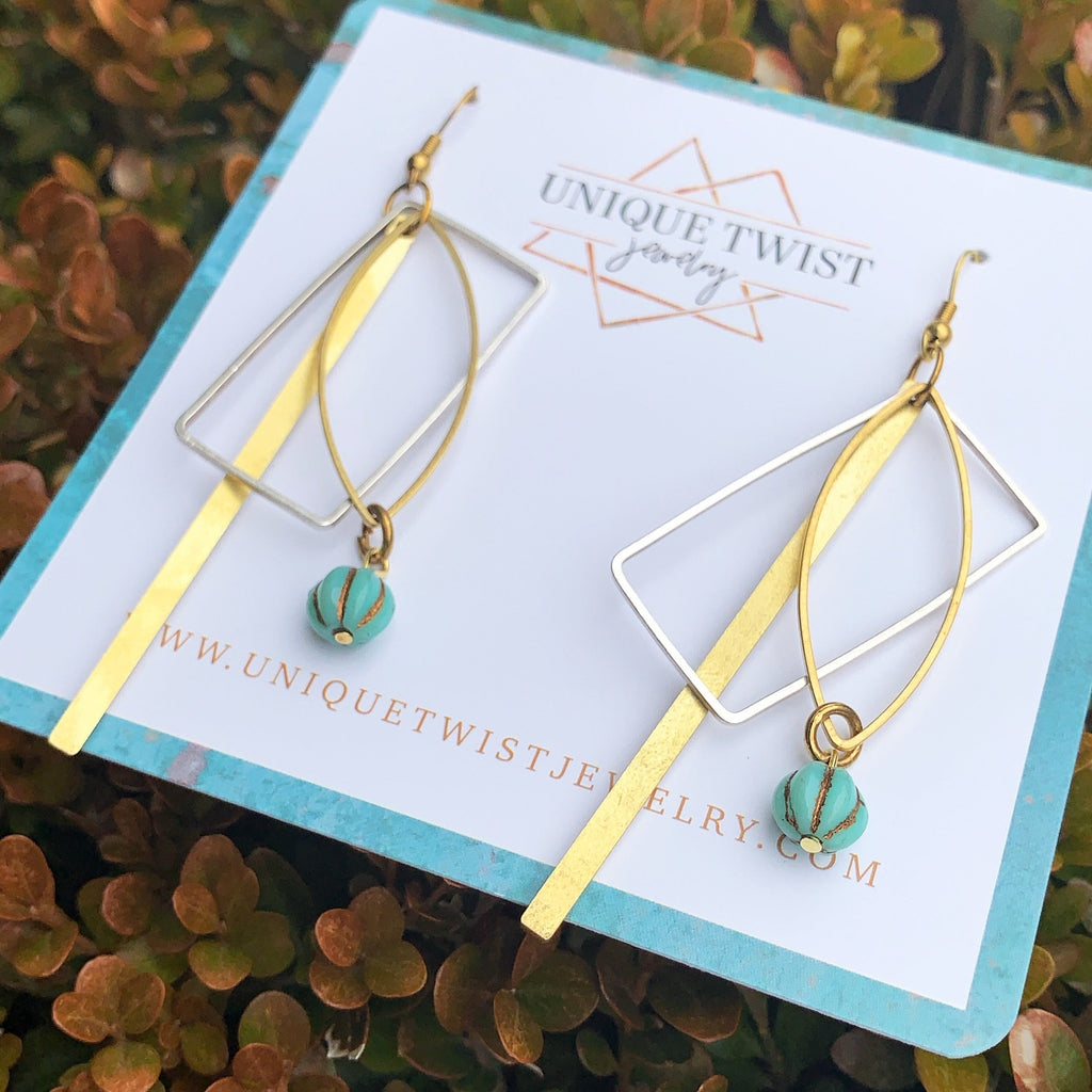 Honoring Emmeline Pankhurst with our Emmeline Earrings. She helped British women win their right to vote. Honoring notable women. Handmade jewelry by Unique Twist Jewelry.