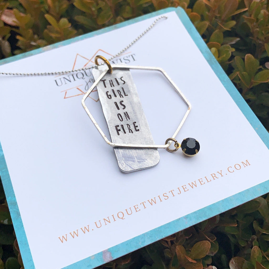 "This girl is on fire" Hand-Stamped necklace. Handmade jewelry by Unique Twist Jewelry.