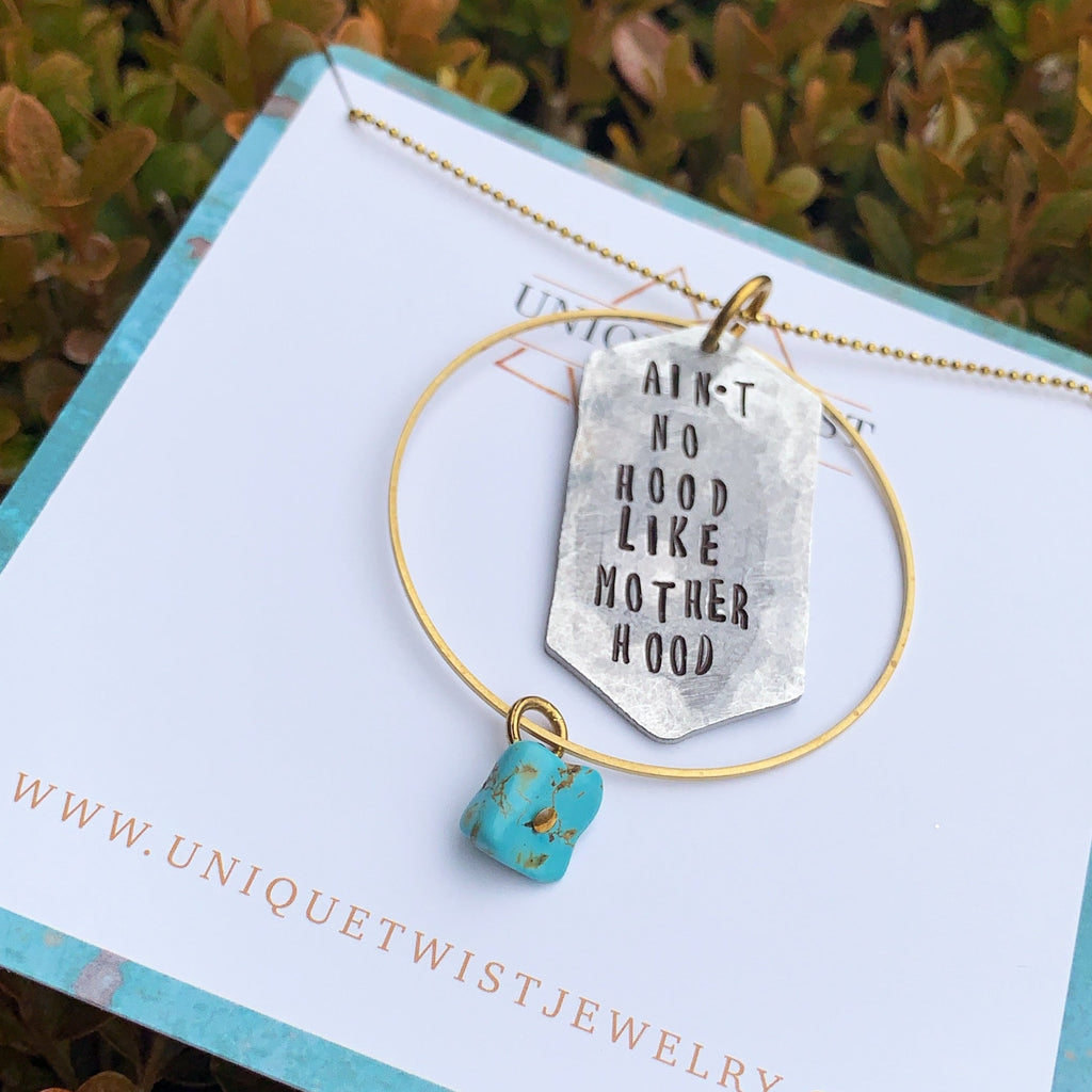 "Ain't No Hood Like Motherhood" Hand-Stamped Necklace. Handmade fashion accessories by Unique Twist Jewelry.