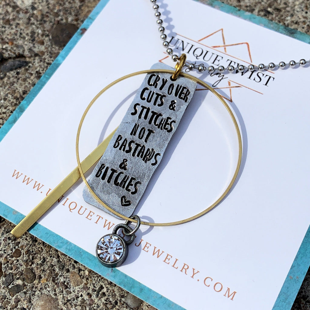 "Cry over cuts and stitches not bastards and bitches" Hand-stamped necklace. Handmade jewelry by Unique Twist Jewelry.