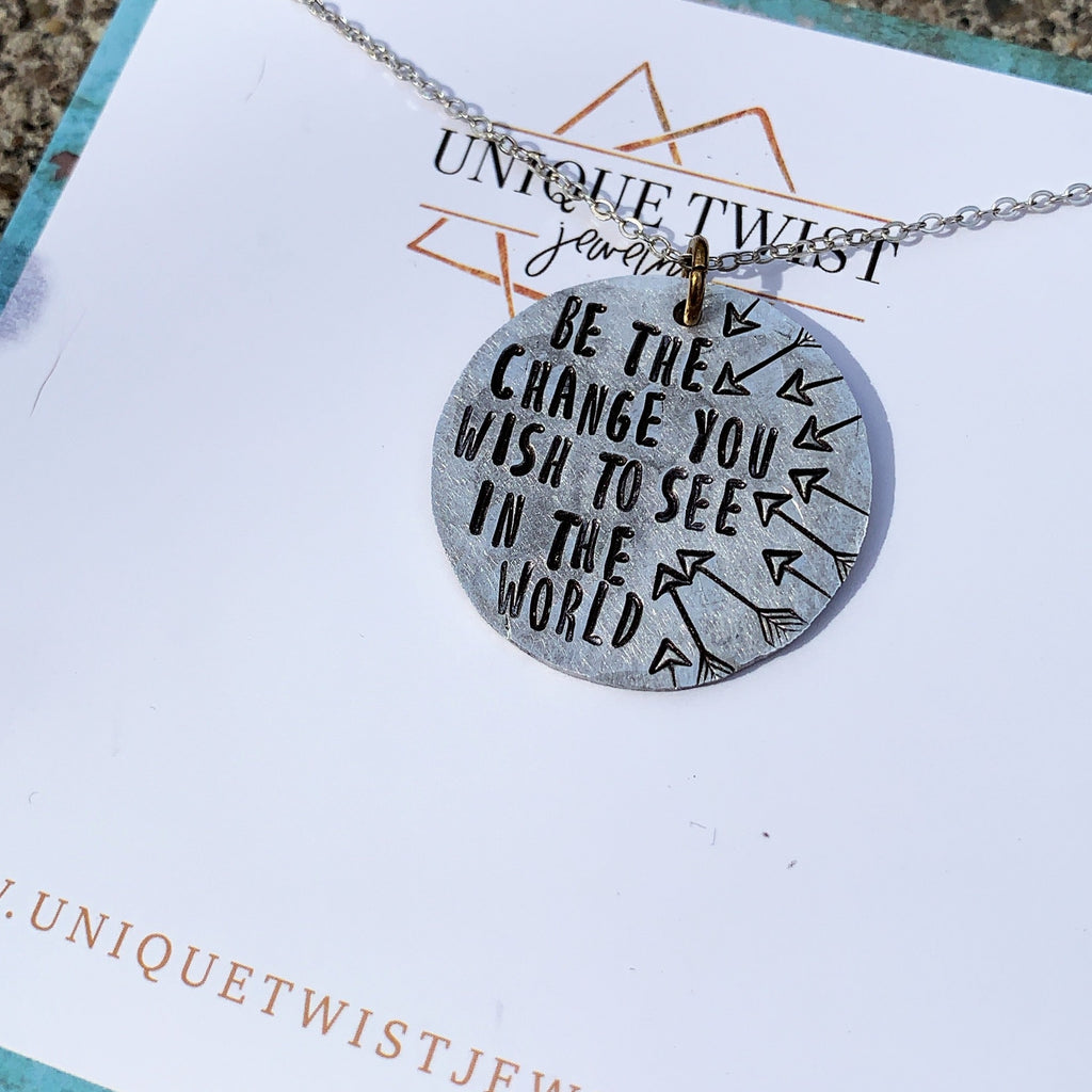 "Be the Change" Hand-Stamped Metal Necklace. Handmade fashion accessories by Unique Twist Jewelry.