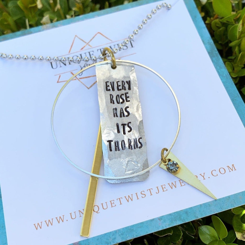 "Every Rose Has Its Thorns" Hand-Stamped necklace. Handmade jewelry by Unique Twist Jewelry.