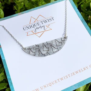 Aluminum Hand-stamped Idaho Moon Necklace. Handmade jewelry by Unique Twist Jewelry.
