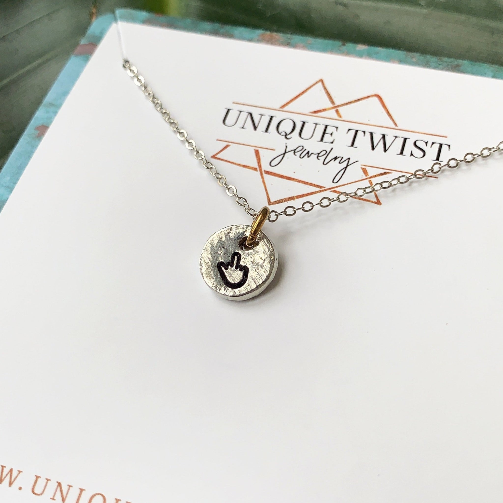 Give em the bird aluminum hand-stamped necklace. Handmade jewelry by Unique Twist Jewelry.