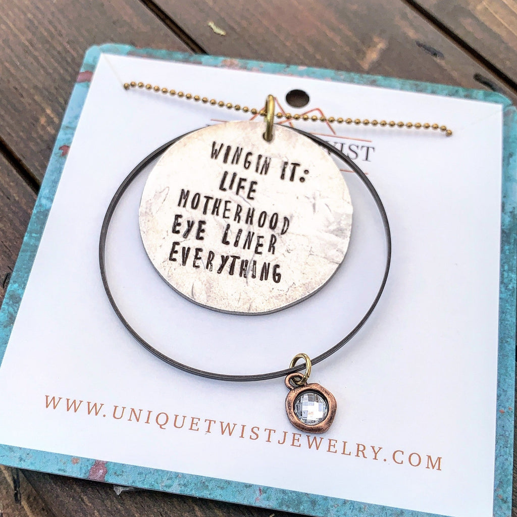 "Winging it: Life. Motherhood. Eye Liner. Everything." Hand-Stamped Necklace. Handmade jewelry by Unique Twist Jewelry.
