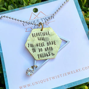 "Beautiful Girl You Were Made to do Hard Things" Hand-Stamped Metal Necklace. Handmade fashion accessories by Unique Twist Jewelry.
